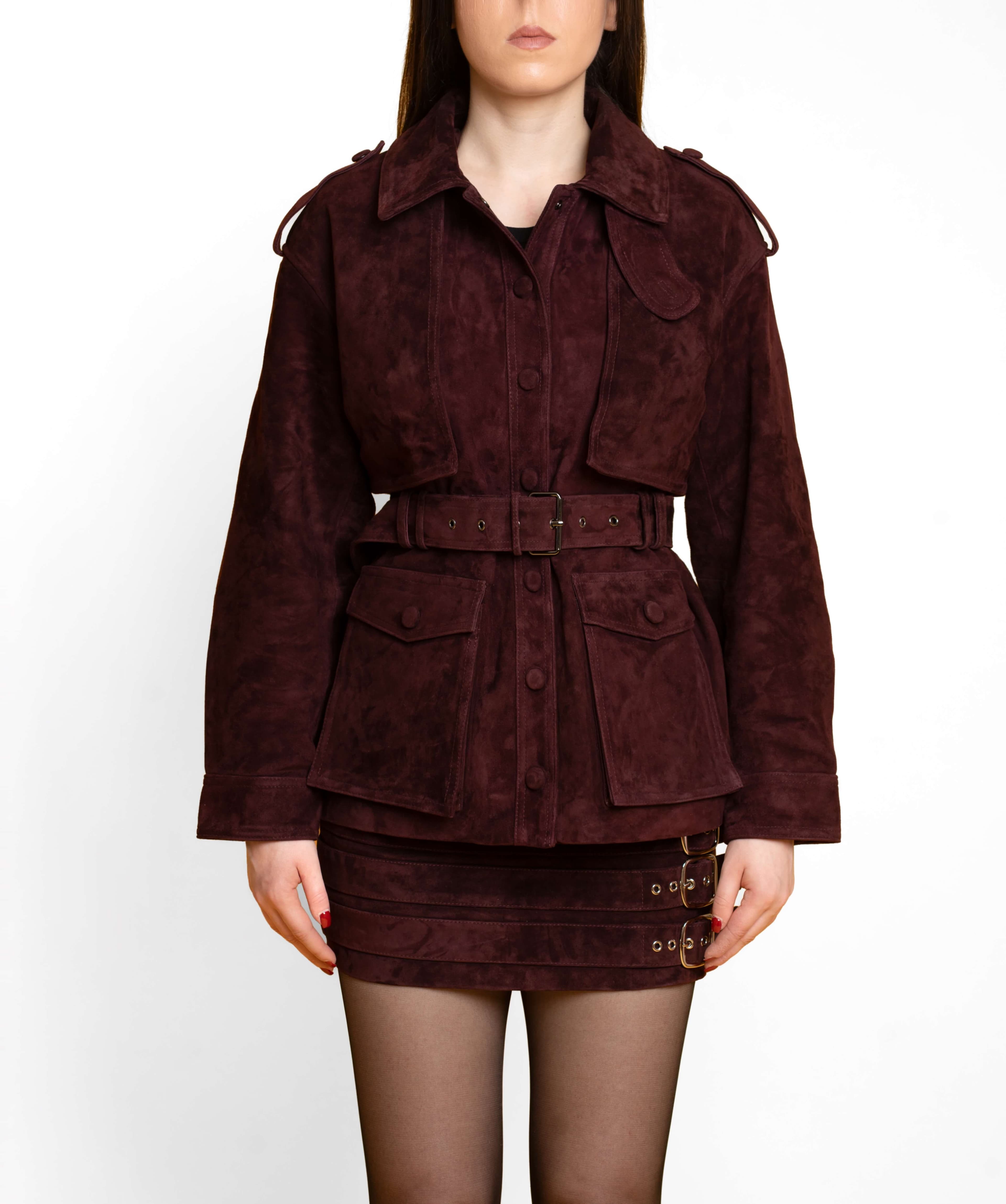 Genuine suede coat draped on a model - rich bordeaux tone with soft nap texture