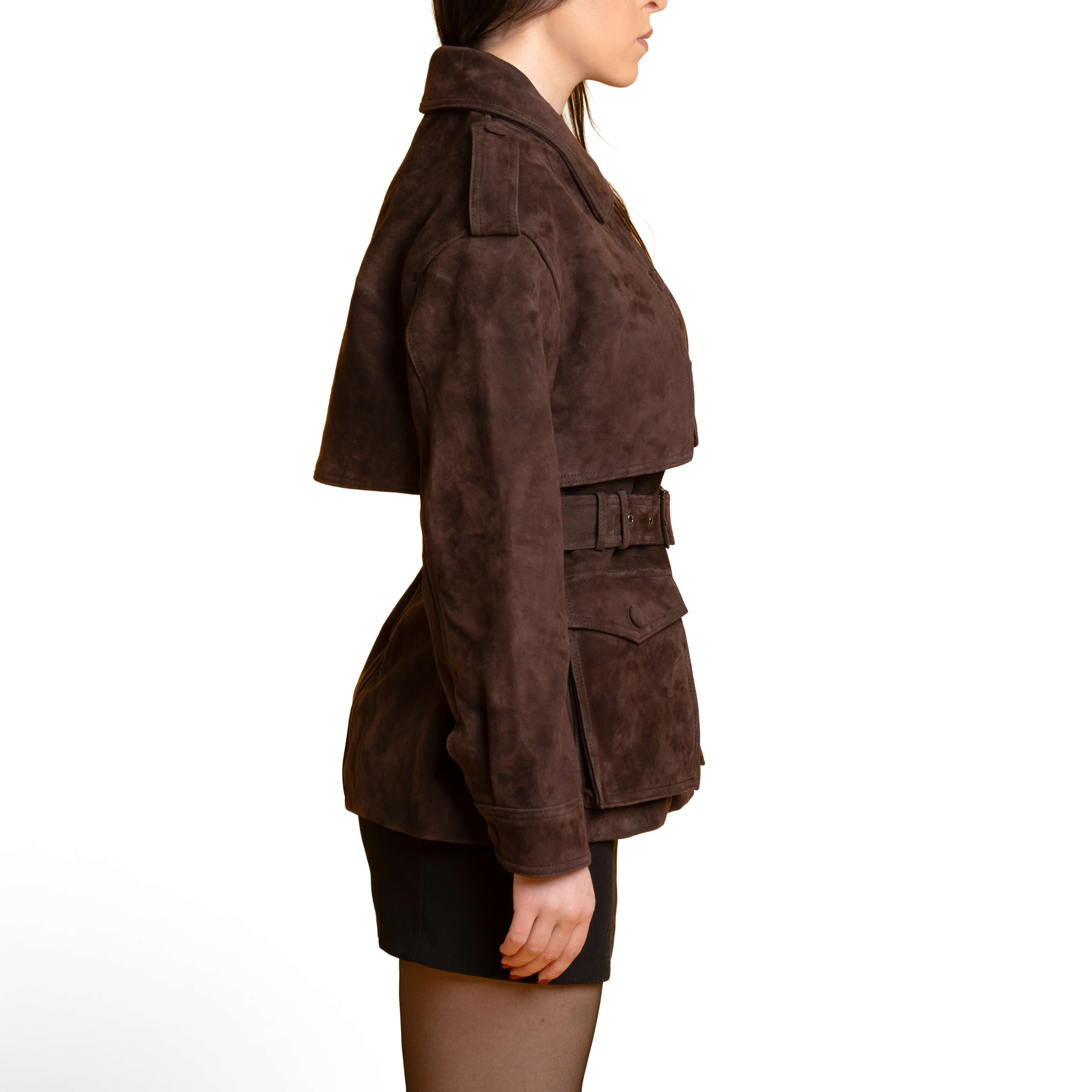 Bordeaux suede coat paired with neutral tones in an editorial setting