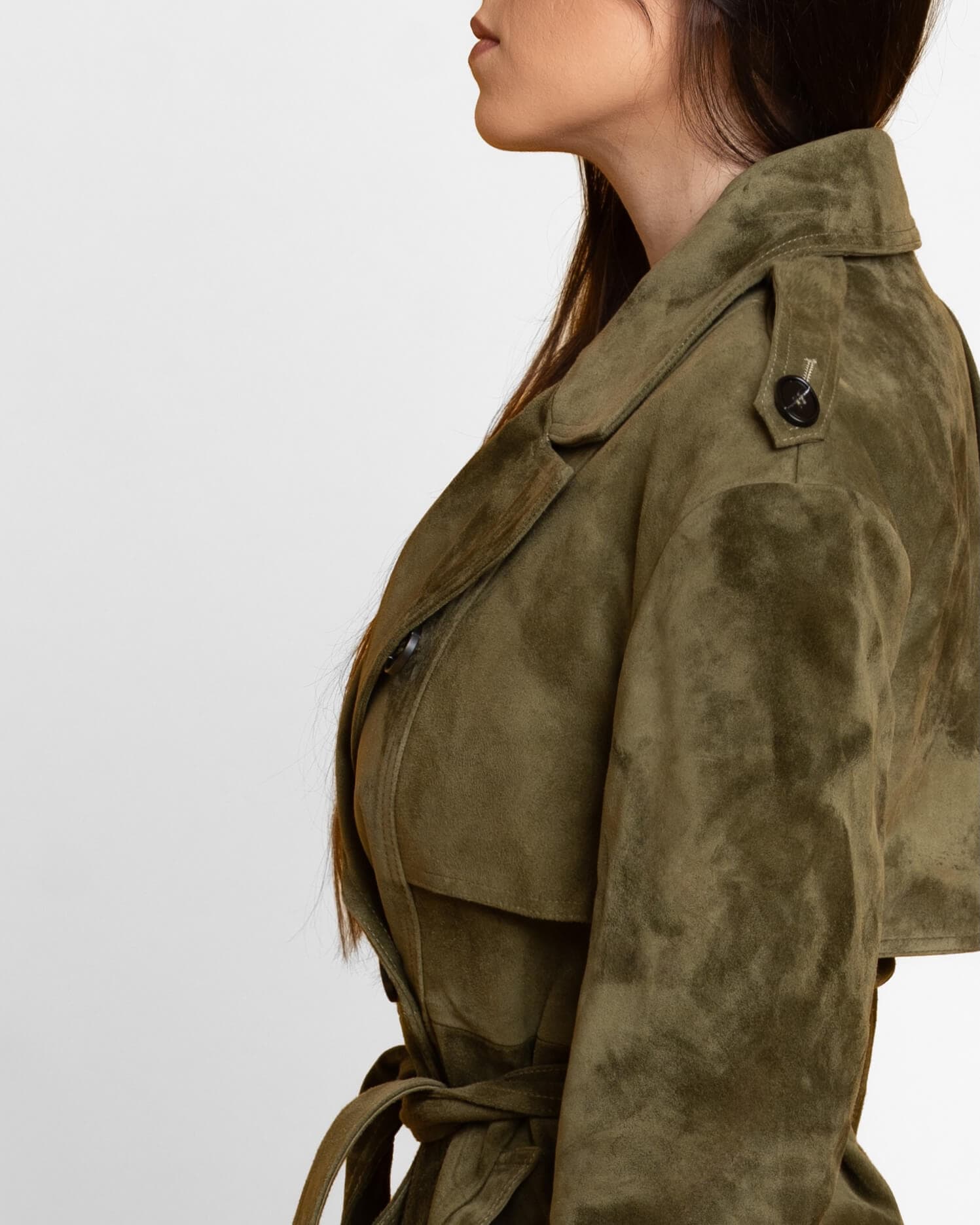 Suede trench coat with belt detail in warm natural light