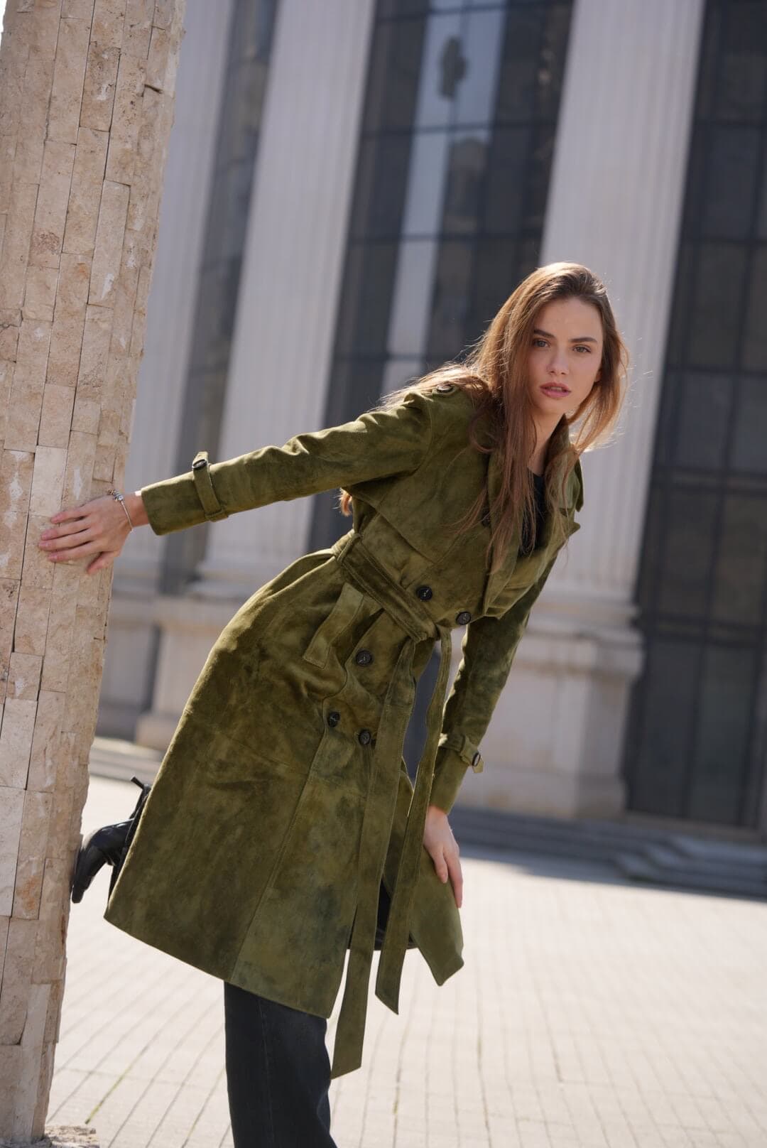 Editorial portrait in a luxury suede trench coat with oversized collar