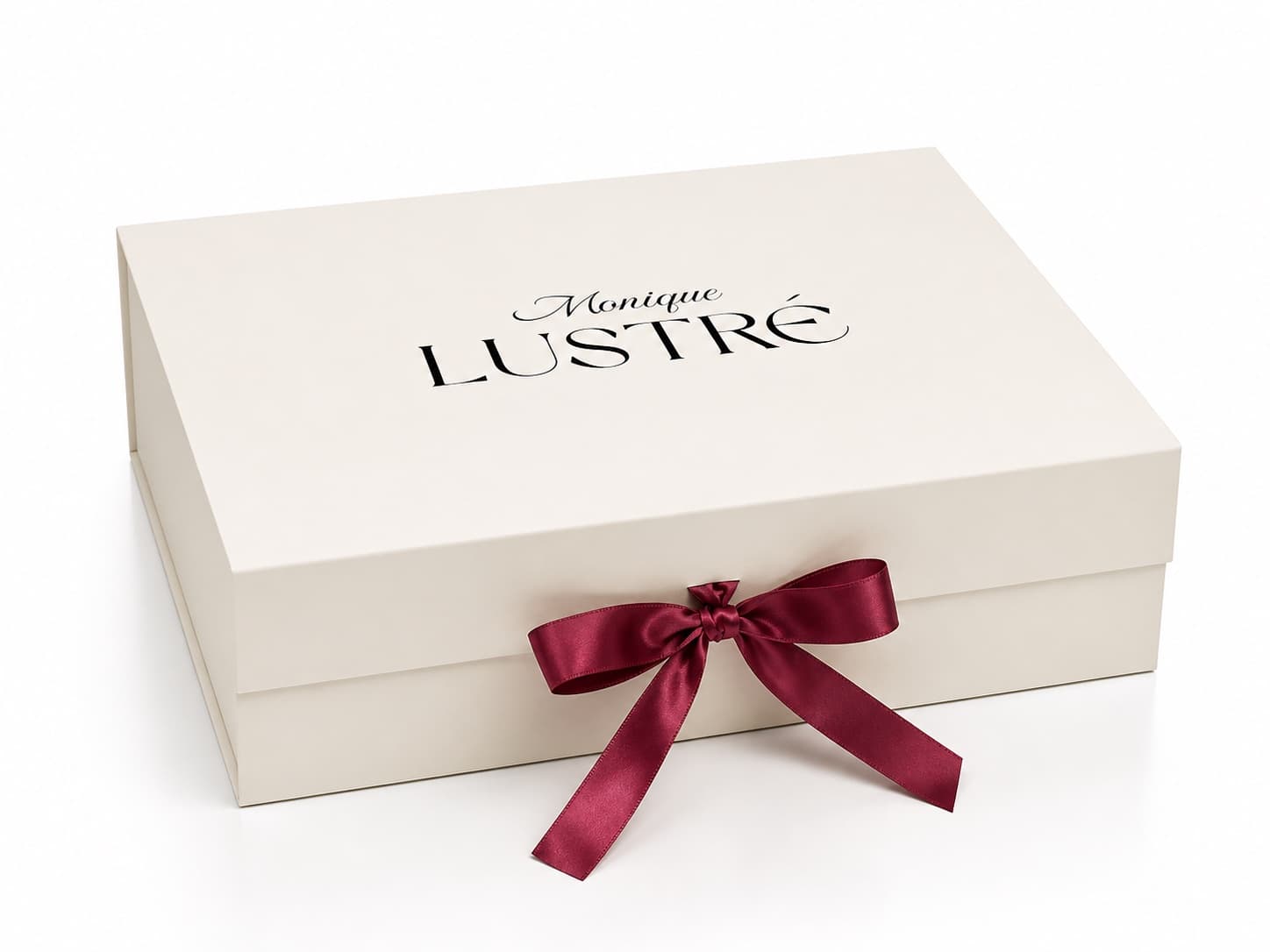 Envoltorio de regalo de cortesía Lustré con cinta atada a mano