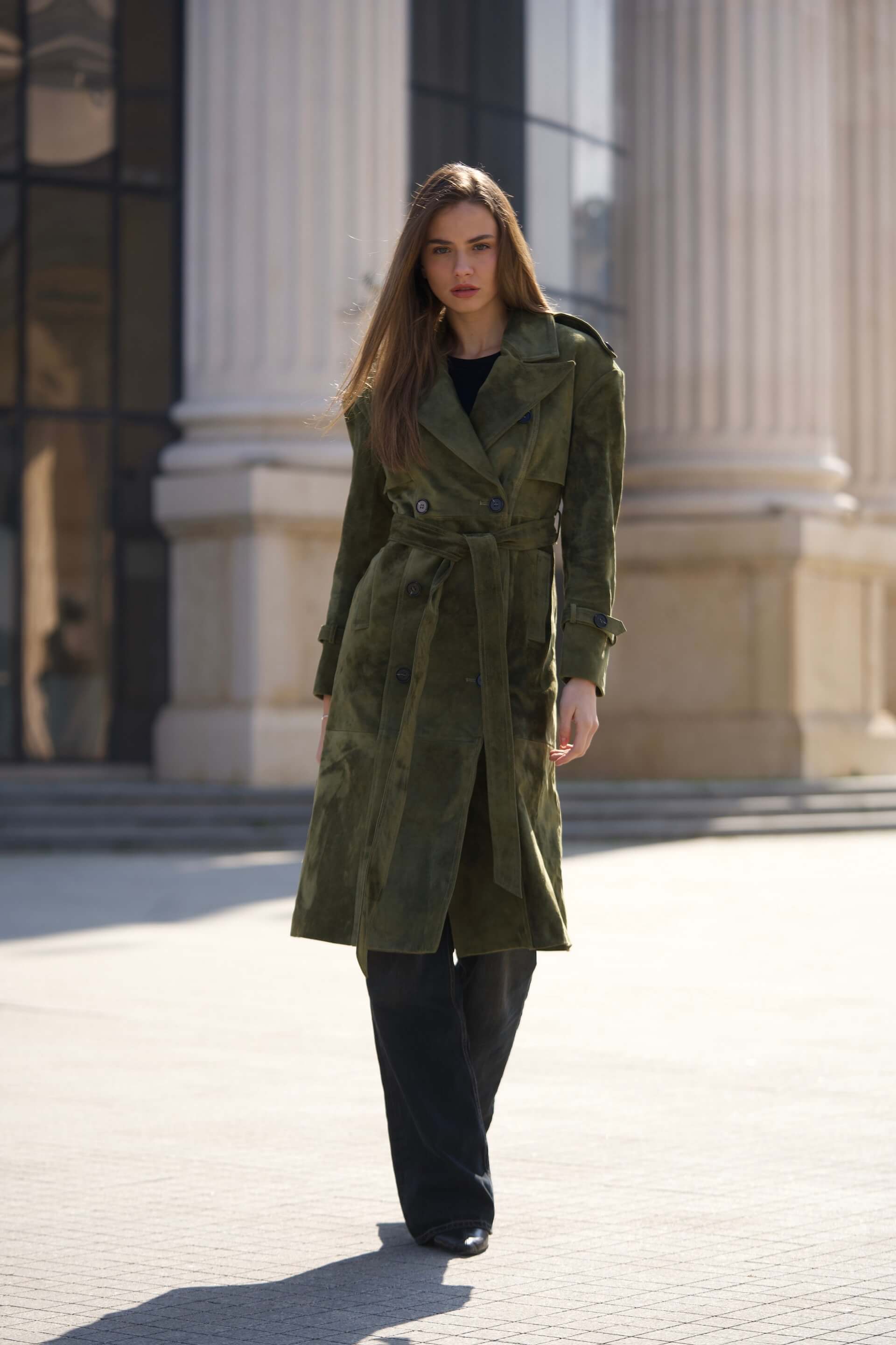 Green genuine suede showing rich colour depth, velvety nap, and natural grain at the Lustré atelier