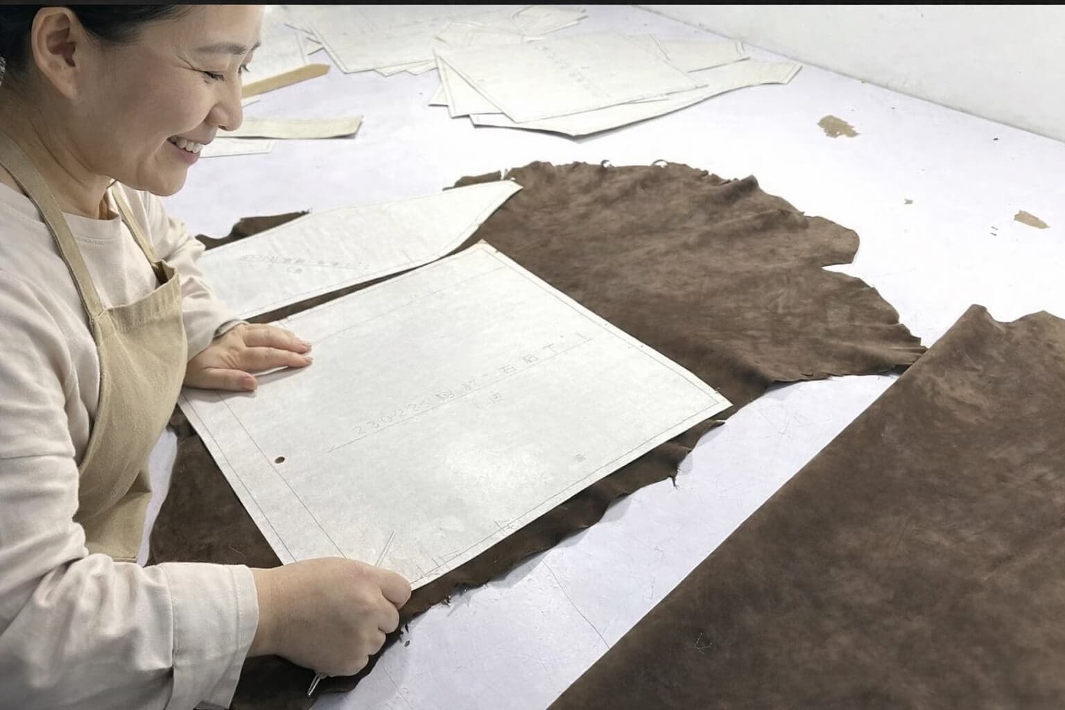 Lustré suede coat representing our story and values